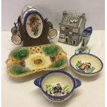 A collection of French Quimper ware. Together with other ceramics.