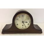 A dark oak wooden case Napoleon hat mantle clock.