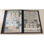 A collection of MINT thematic stamps in stock book - Armed Forces.