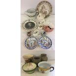 A quantity of ceramic items to include Wedgwood plates, Hilditch saucers & Staffordshire loving cup.