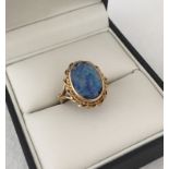 9ct gold dress ring set with an oval fire opal.