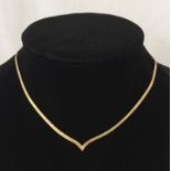 A 9ct gold herringbone collar design necklace.