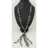 Long jade necklace.