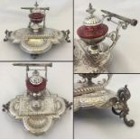 A WMF silver plated desk set with cranberry glass inkwell, decorated with enamel.