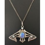 Art Nouveau pewter pendant set with opals.