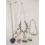 A collection of silver jewellery.
