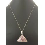 A triangular silver pendant set with polished agate in lilac/grey tones.