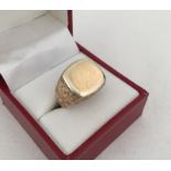 A gents 9ct gold signet ring.