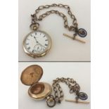 A vintage Elgin gold plated pocket watch in working order.