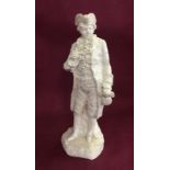 An 18th century Naples figurine of a gentleman holding a bag.