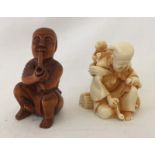 2 carved netsuke's.