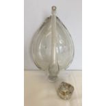 An antique weather glass liquid barometer.