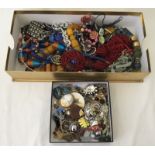 2 boxes containing a large quantity of costume jewellery.