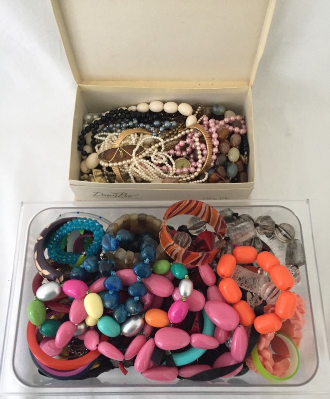 2 boxes full of costume jewellery.