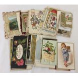 A quantity of antique greetings cards.