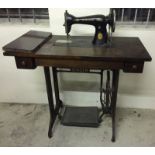A Singer treble sewing machine / table, with 2 drawers to front.