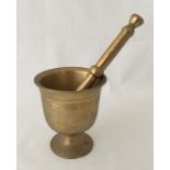 A vintage brass pestle & mortar.