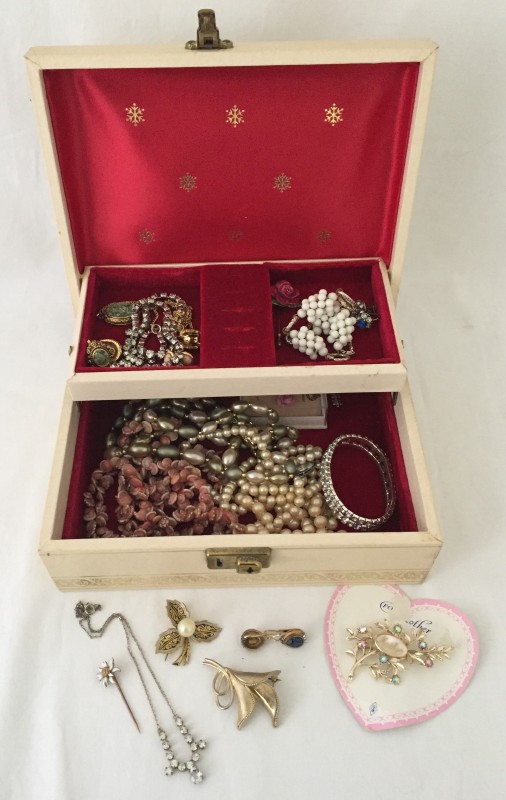 A collection of vintage costume jewellery .