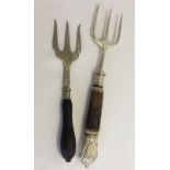 A Victorian silver bread fork with horn handle. Sheffield 1896 together with an EPNS bread fork.