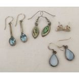 4 pairs of 925 silver earrings.