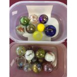 A collection of marbles, mainly large diameter.