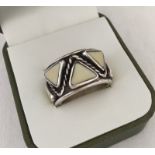 Chunky hallmarked silver ring with stone set triangles & rope design.