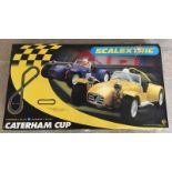 Scalextric set - Caterham Cup.