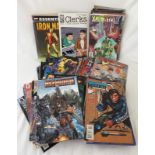 A box of assorted comics and comic books.