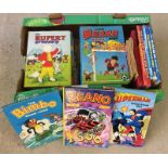 A box of children's books and annuals to include Rupert Bear.