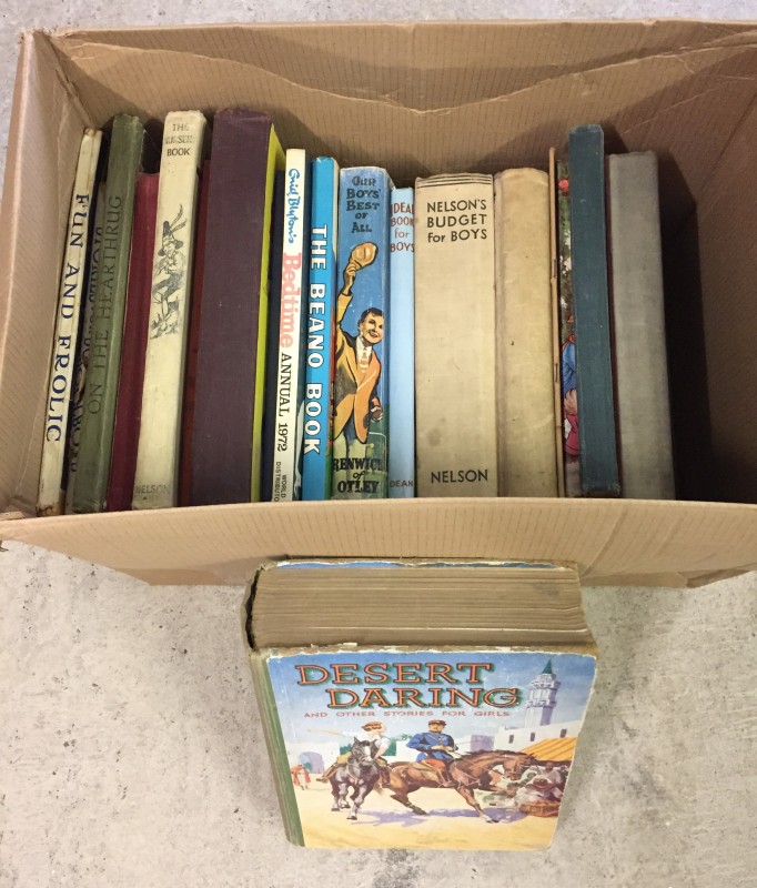 A box of vintage children's books & annuals.