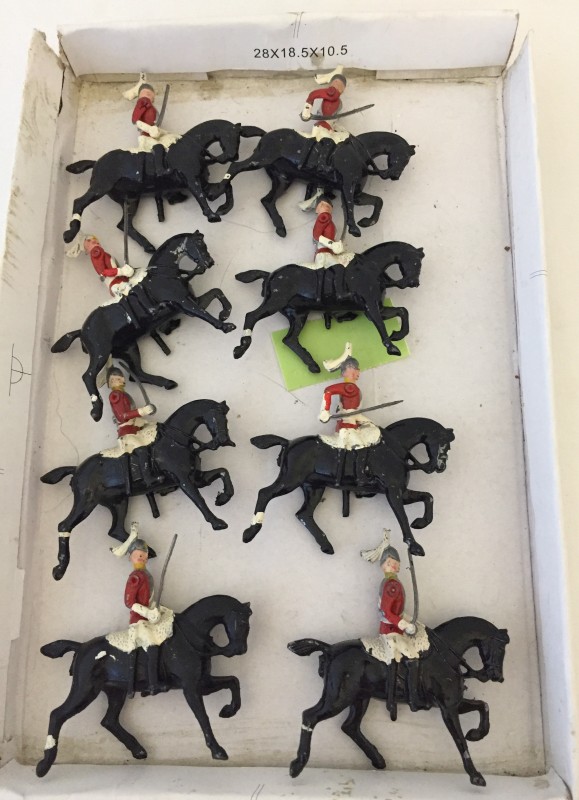 8 unboxed Hill & Co. lead mounted Lifeguard toy soldiers.