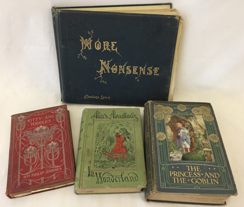 Four antiquarian children's books.