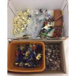 A collection of plastic toy soldiers & metal wargame figures.