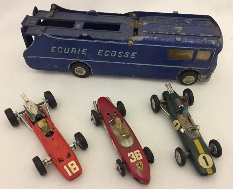 A Corgi Ecurie Ecosse Racing Car Transporter & 3 racing cars.