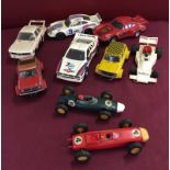 9 unboxed Scalextric cars.