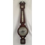 A 19th century Mahogany banjo barometer by Cattino & Co. York.