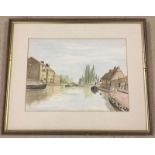 A framed and glazed watercolour of a canal scene at Stoke Bruerne by A.E. Eling.