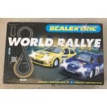 A boxed Scalextric World Rally, with Renault Megane cars.