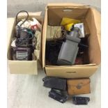 2 boxes of vintage camera's, slide projectors and accessories.