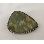 Large polished agate brooch.