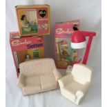 A boxed Sindy white sofa and boxed matching armchair.