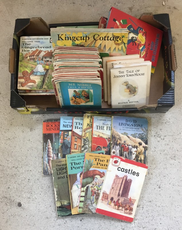 A box of vintage children's books.