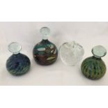 3 Mdina glass paperweights, 2 signed to base, together with a clear glass apple paperweight.