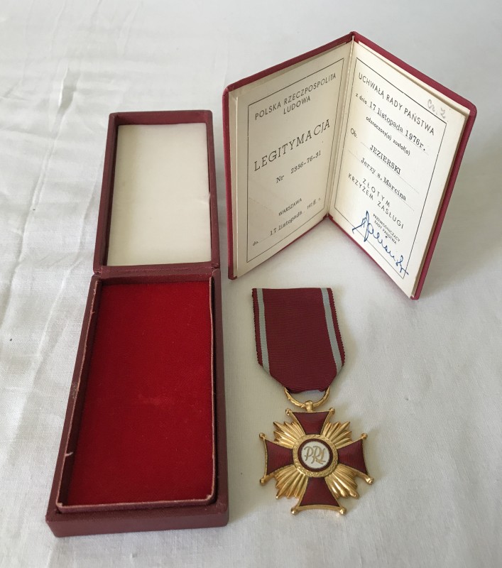 A gilt award Polish Cross of Merit, boxed and with certificate.