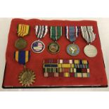 A case containing 6 American medals including an Air medal, Vietnam and War on Terror.