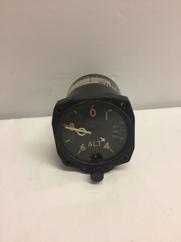 A vintage black Bakelite altimeter for British Aircraft with Crown & AM mark.