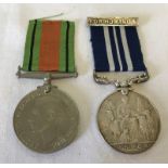 An RSPCA "For Humanity" medal together with a 1939-45 defence medal.