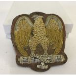 An Italian WWII Officers Bullion cap badge.