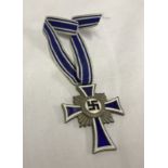 A German WWII Mothers cross.