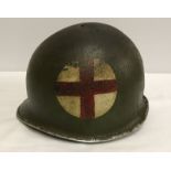 America WW2 fixed bale tin helmet.